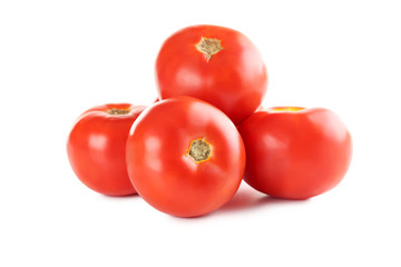 Fresh red tomatoes isolated on a white