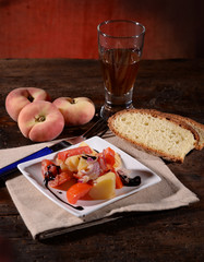 vegetarian side dish of potato tomato and onion