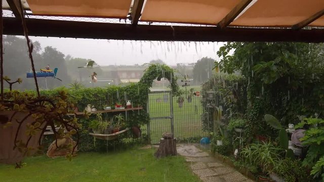 Water pouring into gutter during powerful storm