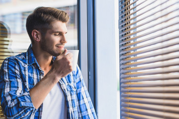 male enjoying fresh air and coffee