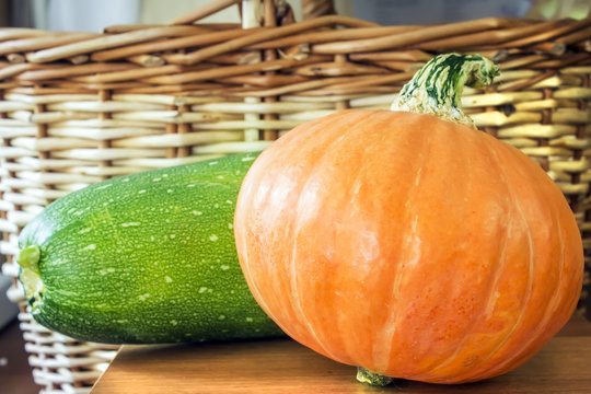 Pumpkin and squash on a background of the baskets