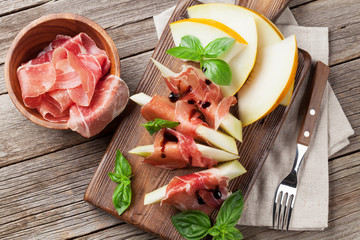 Fresh melon with prosciutto and basil