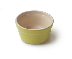 Glazed ceramic pot for cooking on a white background