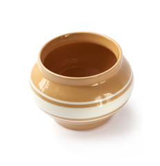 Glazed ceramic pot for cooking on a white background