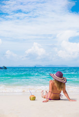 Cute woman relaxing on the beach