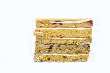 Snack protein raisin bar isolated on white