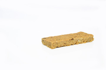 Snack protein raisin bar isolated on white
