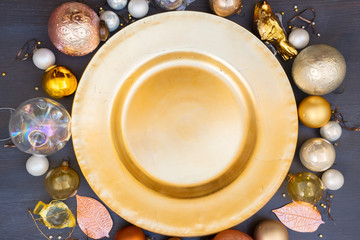 Christmas empty golden plate with gold decorations