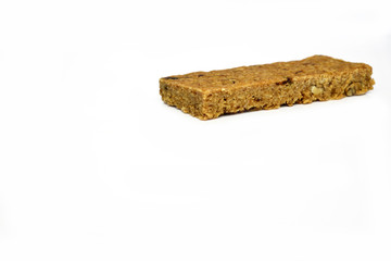 Snack protein raisin bar isolated on white