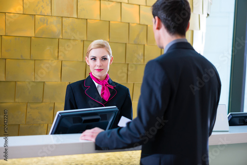 "Hotel Receptionist Check In Man Giving Key Card" Stock
