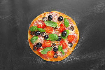 Delicious pizza on gray background