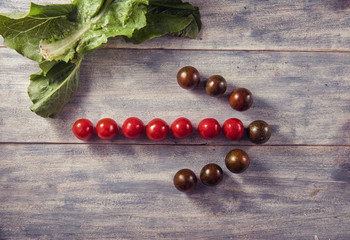 Healthy Organic Vegetables Tomatoes on a Wooden Background. Art