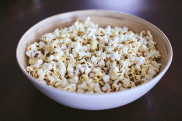 large white plate with popcorn