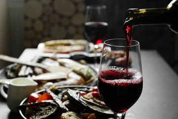 Delicious dinner with grilled vegetables and wine