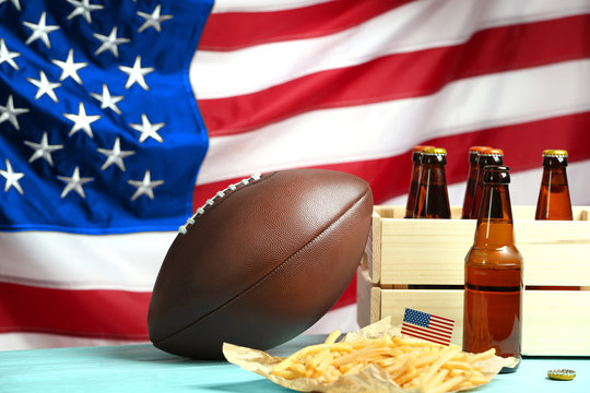 American traditional food with rugby ball on national flag background