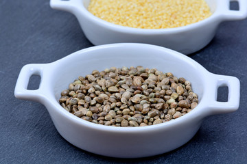 Hemp seeds with millet seeds in a ceramic bowls