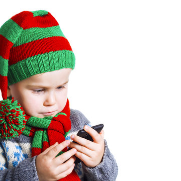 Boy sends a text message with a Christmas wish to Santa