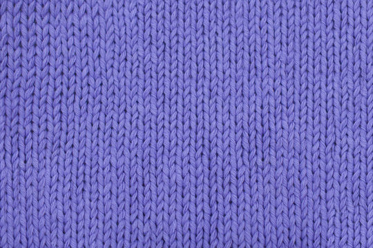 Abstract lavender knitting texture close-up.