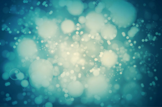 Vector teal bokeh background. abstract defocused bright lights