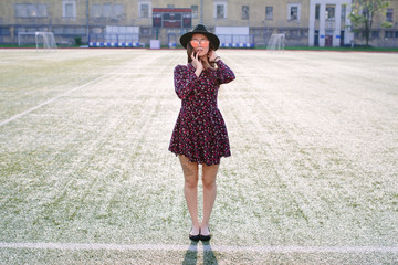 Naklejka premium Girl in dress posing