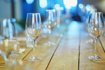 Row of wine glasses on the table in restaurant