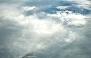 clouds view from the window of an airplane flying in the clouds