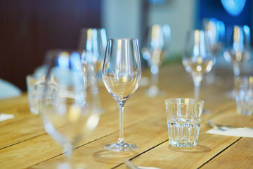 Row of wine glasses on the table in restaurant
