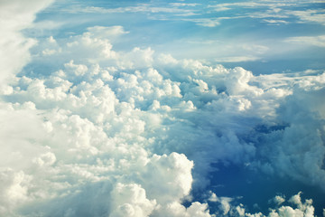 clouds view from the window of an airplane flying in the clouds