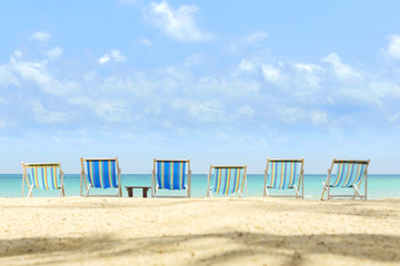 canvas beach bed on the beach with nice sky and cloud
