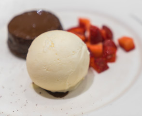 Chocolate lava cake with ice cream .
