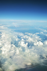 clouds view from the window of an airplane flying in the clouds