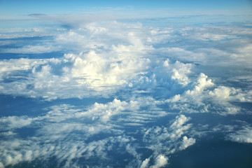 clouds view from the window of an airplane flying in the clouds