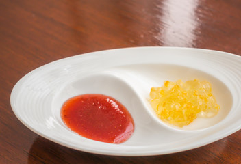 Fruity jams on white  plate .