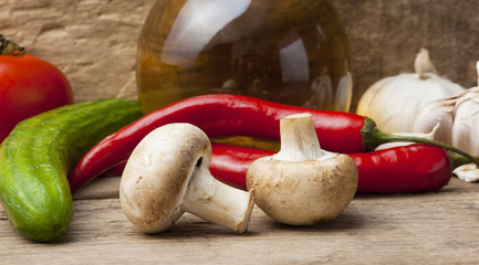 bottle of sunflower oil and vegetables