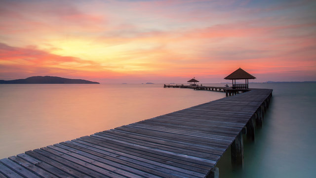 Wooden pier between sunset in Phuket