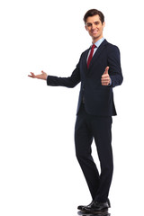 young business man presenting and making the ok sign