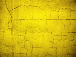background made with a texture of a yellow wall