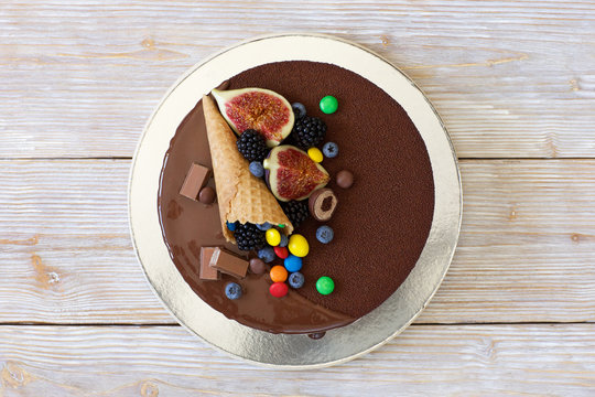 Child Chocolate Cake With Colorful Candy