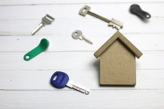 appartment key on wooden background