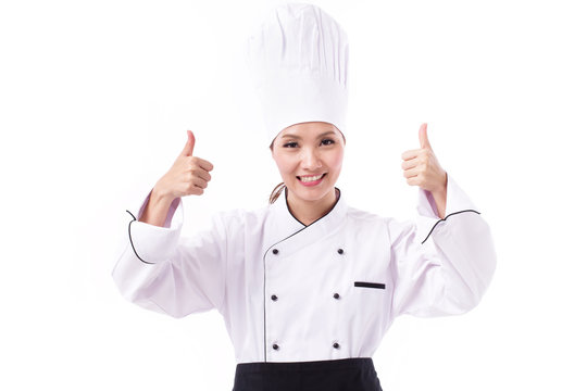 happy, smiling, positive female chef showing double thumbs up