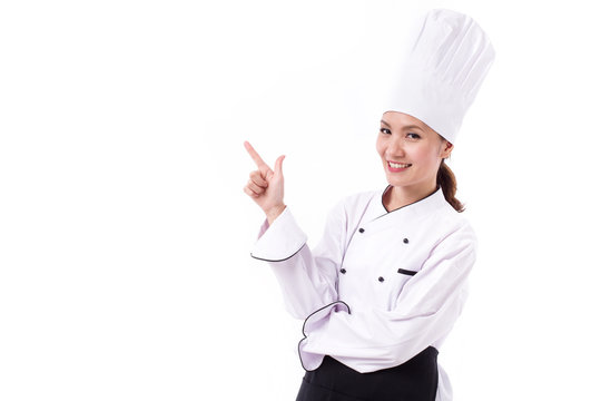 happy, smiling, positive female chef pointing up