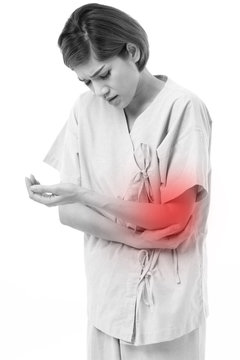 woman suffering from elbow joint pain, arthritis, gout