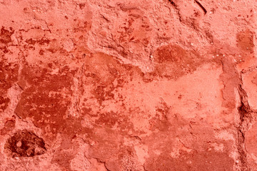 Wall fragment with scratches and cracks