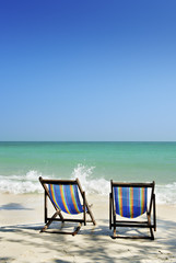 chair in sea sand sun
