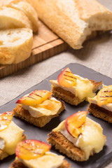 canapes, appetizer with grilled brie
