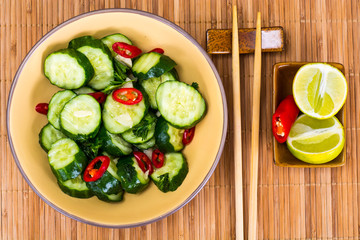 Salad Cucumber, Chilli, Garlic on a Bamboo Mat