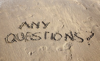 Any Questions writing on the beach