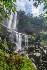Landscape of Tad Huay Ping waterfall in deep rain forest of Bola