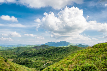 Mountain range green hill with cloud on blue sky