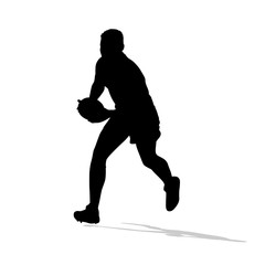 Obraz premium Rugby player running with ball in hands. Vector silhouette